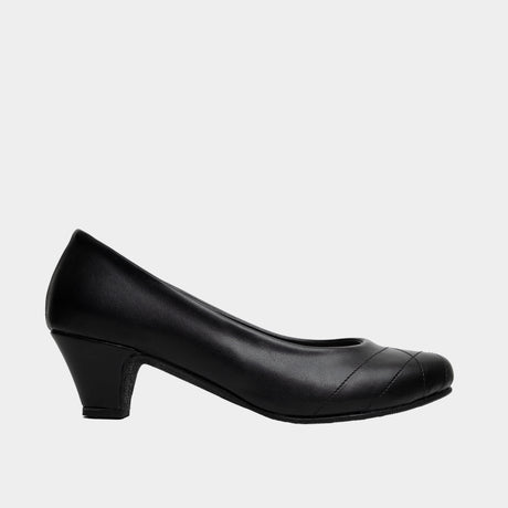Black faux leather with 1.5 inch block heel pump with round toe, quilted stitch detail.