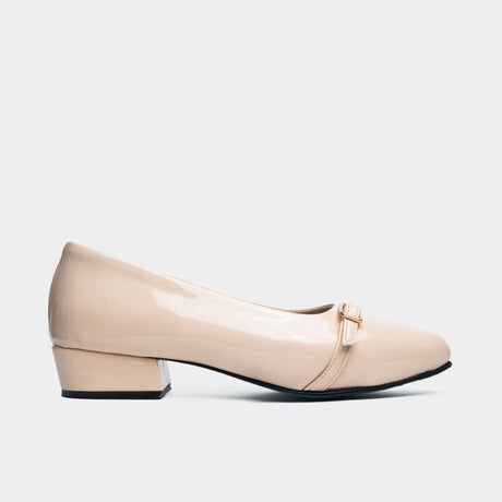 Beige patent leather pointed-toe flat with buckle detail