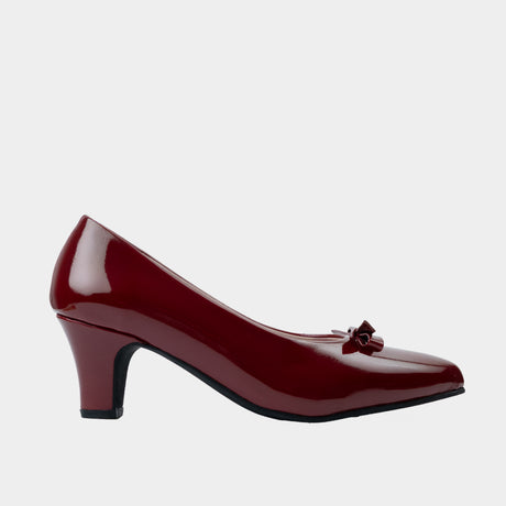 Maroon patent leather pointed-toe pump with rosette bow detail and 1-inch kitten heel