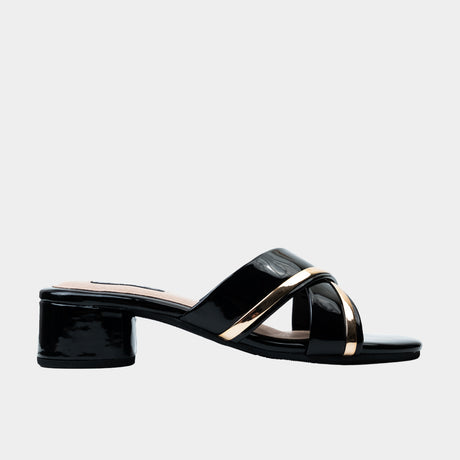 Black patent leather crisscross slide sandal with metallic gold trim and 2-inch low block heel.