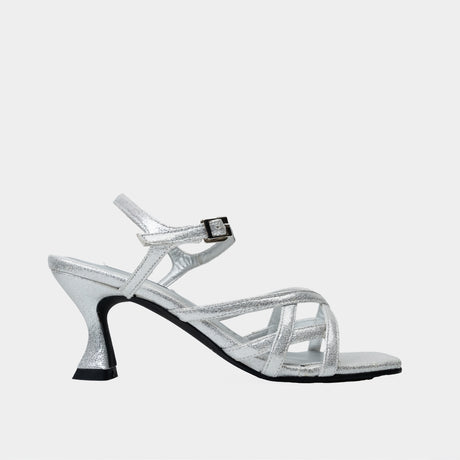 Silver metallic strappy sandal with crisscross toe straps and 2.5-inch flared spool heel